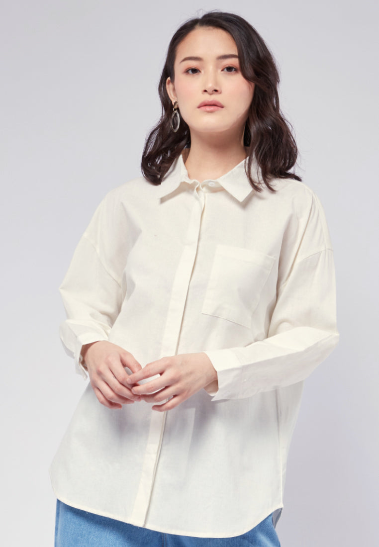 Oversized Blouse with Pocket Details