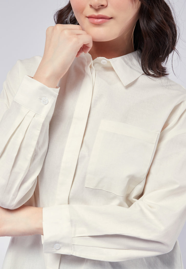 Oversized Blouse with Pocket Details