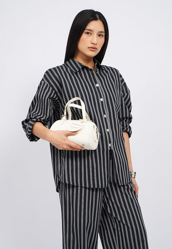 Off White Sling Bag with Charm
