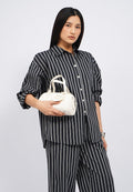 Off White Sling Bag with Charm