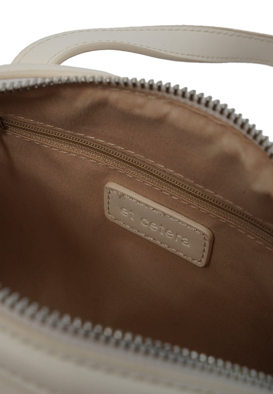 Off White Sling Bag with Charm