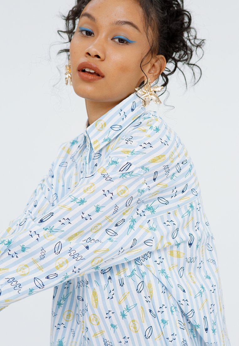 All Over Print Asymmetric Blouse